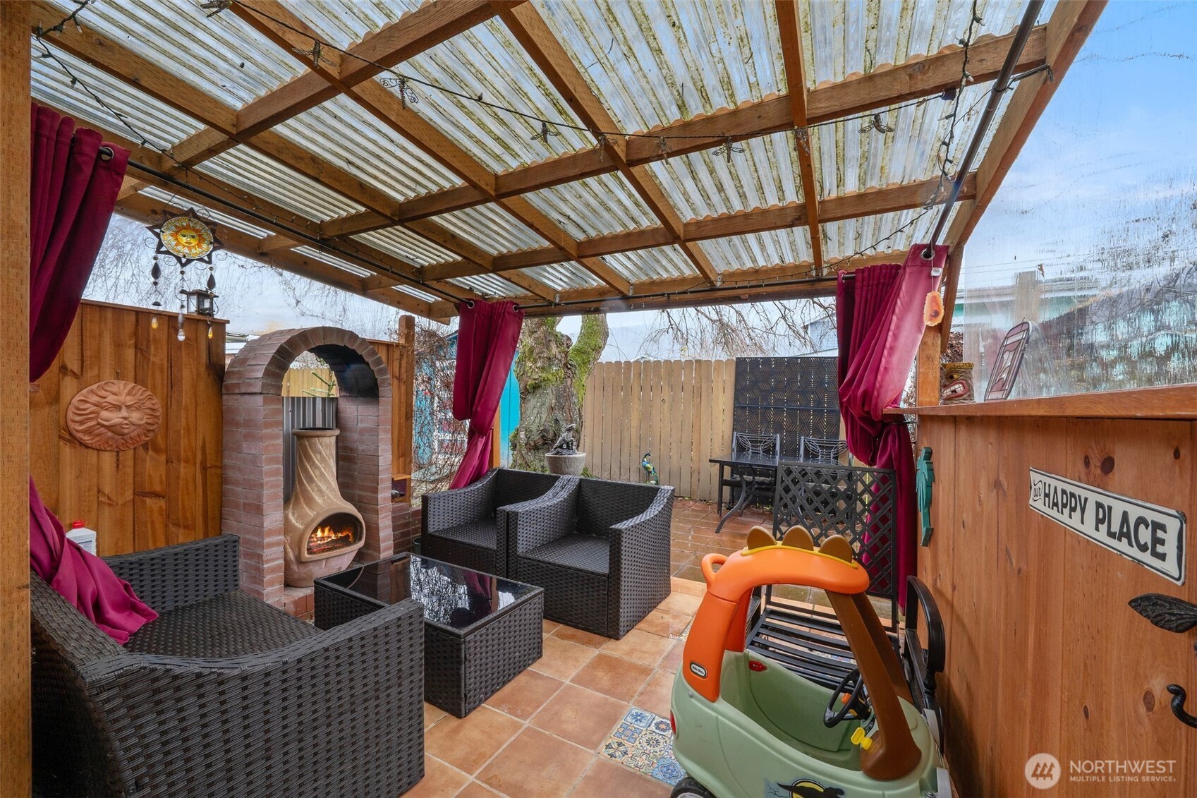 701 Jennings Street Sedro-Woolley, WA 98284 - Photo 33 of 40 a living room with furniture and a floor to ceiling window