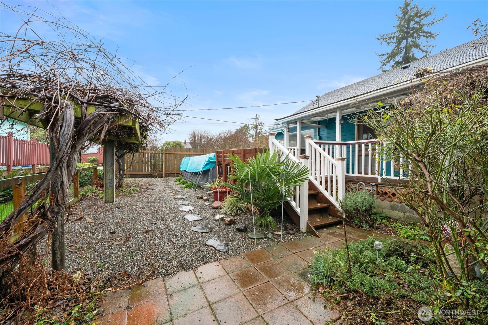 701 Jennings Street Sedro-Woolley, WA 98284 - Photo 36 of 40 a view of a chair and table in the backyard