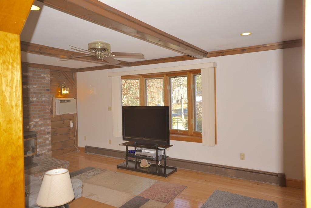 8 Betty Spring Road Freetown, MA 02717 - Photo 15 of 39 a living room with furniture and a flat screen tv