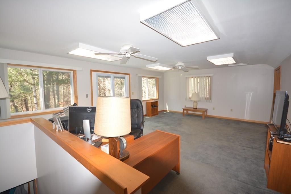 8 Betty Spring Road Freetown, MA 02717 - Photo 20 of 39 a living room with furniture and a large window
