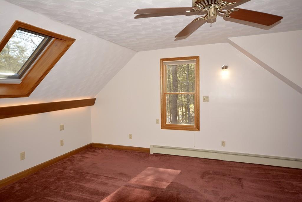 8 Betty Spring Road Freetown, MA 02717 - Photo 30 of 39 an empty room with windows and fan