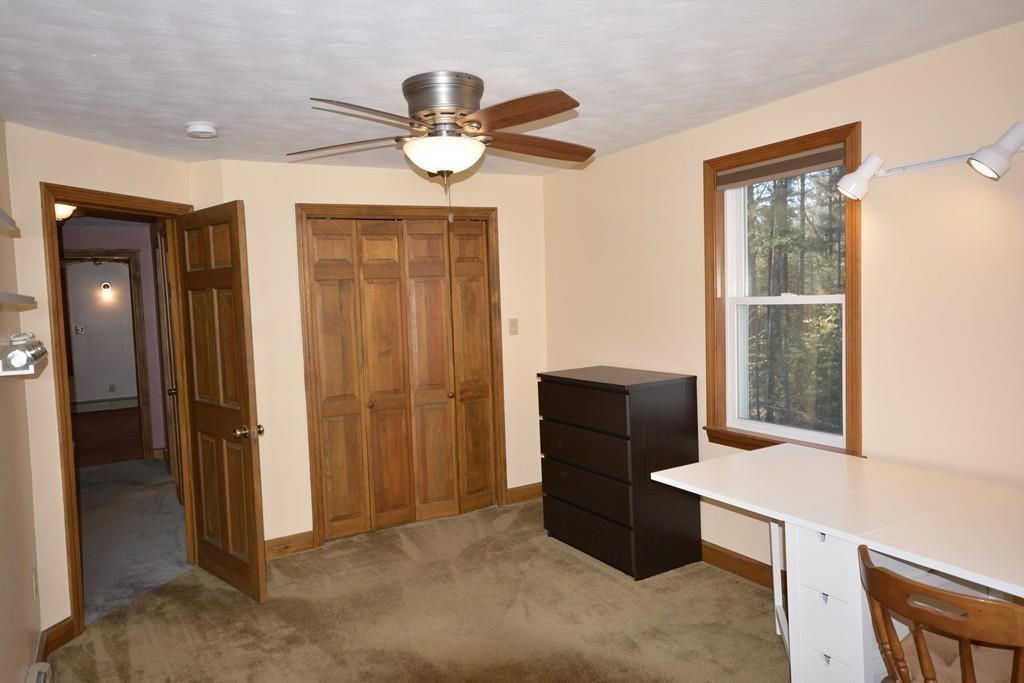 8 Betty Spring Road Freetown, MA 02717 - Photo 34 of 39 wooden floor and windows in a room