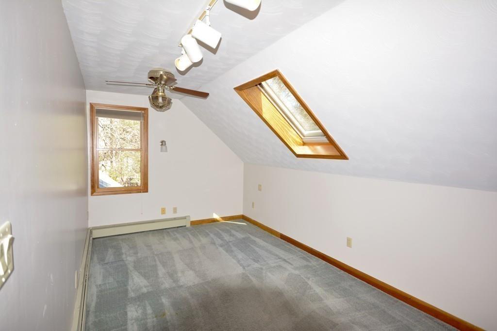 8 Betty Spring Road Freetown, MA 02717 - Photo 35 of 39 an empty room with windows and fan
