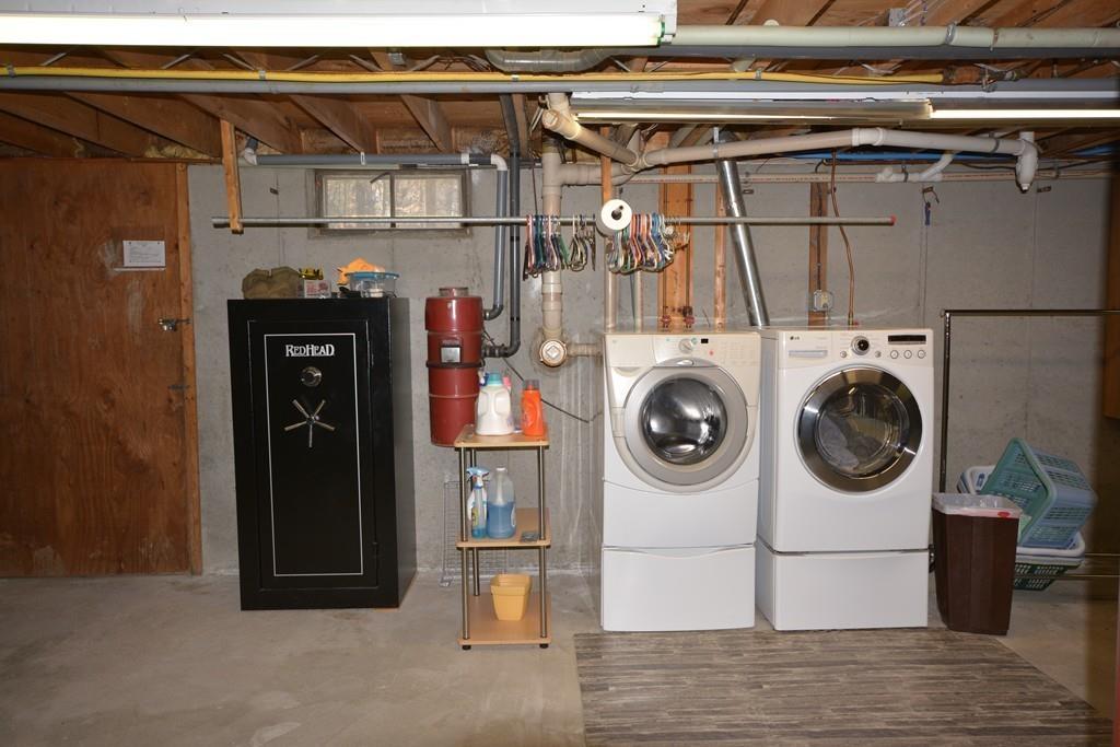 8 Betty Spring Road Freetown, MA 02717 - Photo 39 of 39 a utility room with dryer and washer