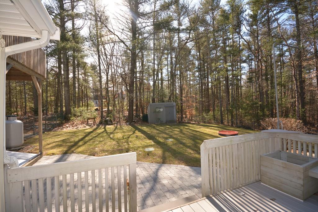 8 Betty Spring Road Freetown, MA 02717 - Photo 5 of 39 a view of a backyard with basketball court