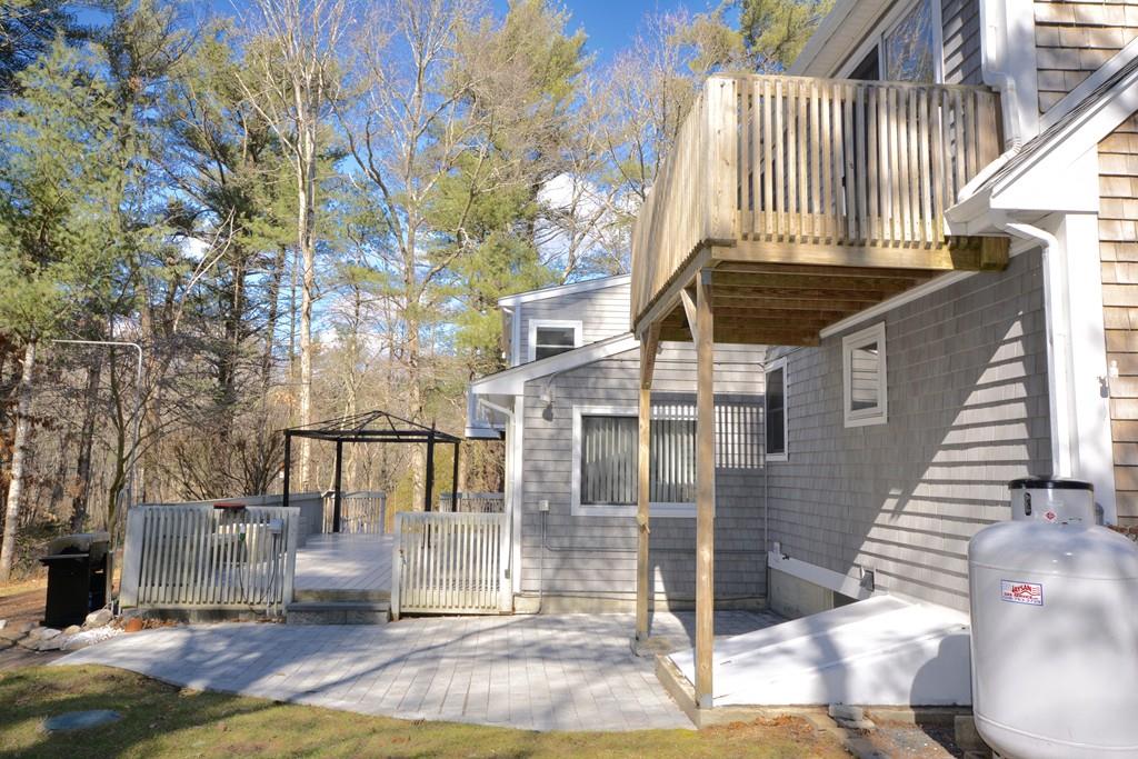 8 Betty Spring Road Freetown, MA 02717 - Photo 8 of 39 a front view of a house with street