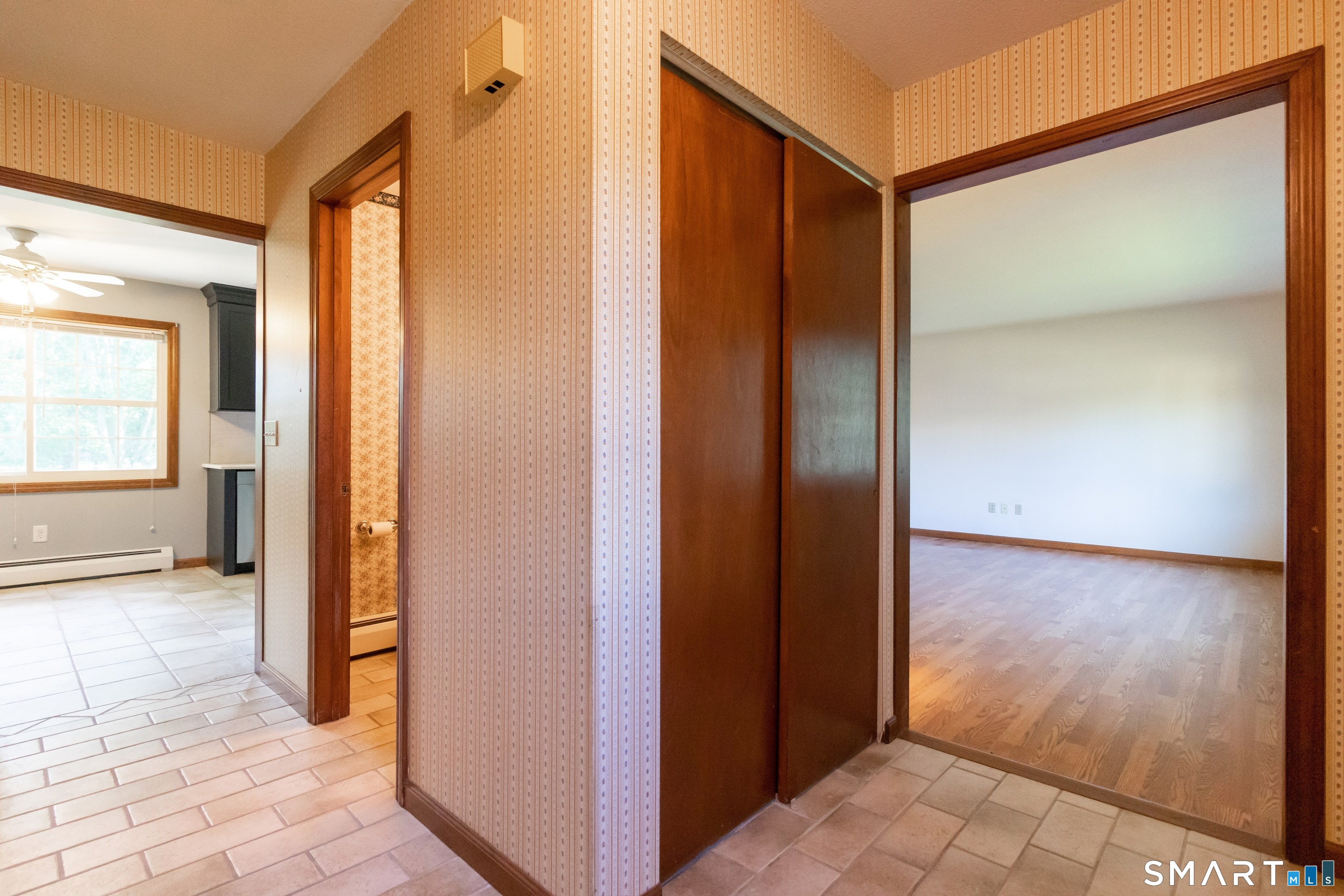 15 Kennedy Road Windsor, CT 06095 - Photo 5 of 40 Front foyer has access into formal living, half bath and kitchen