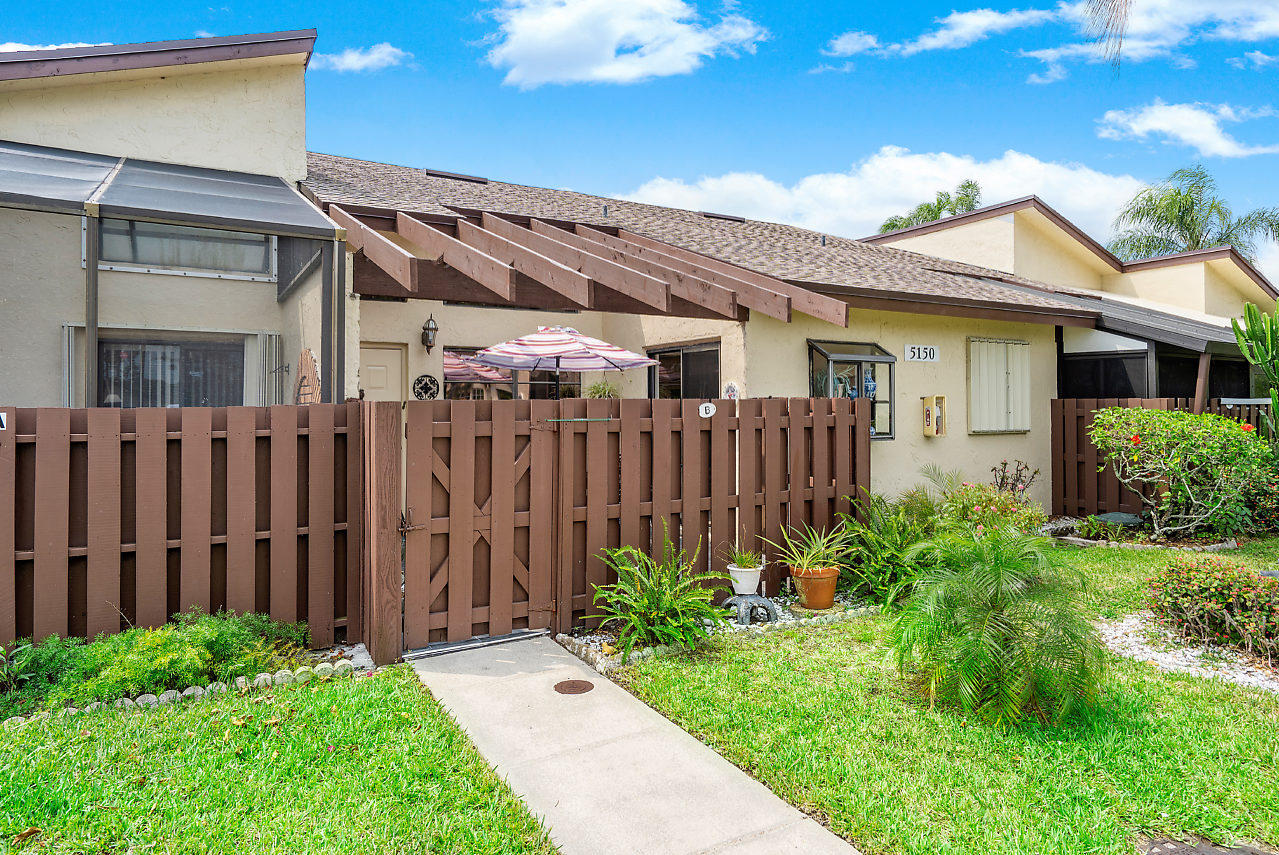 5150 Nesting Way, Unit B Delray Beach, FL 33484 - Photo 3 of 28 View of Front