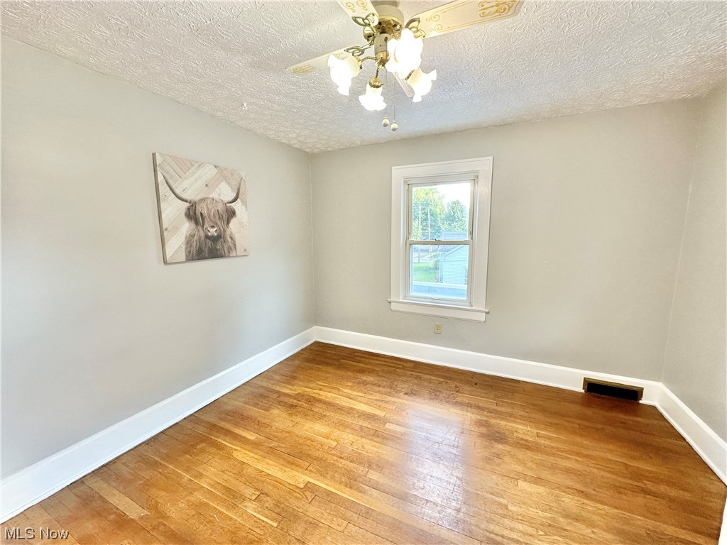 1140 Berwin Street Akron, OH 44310 - Photo 15 of 22 3rd bedroom featuring hardwood floors