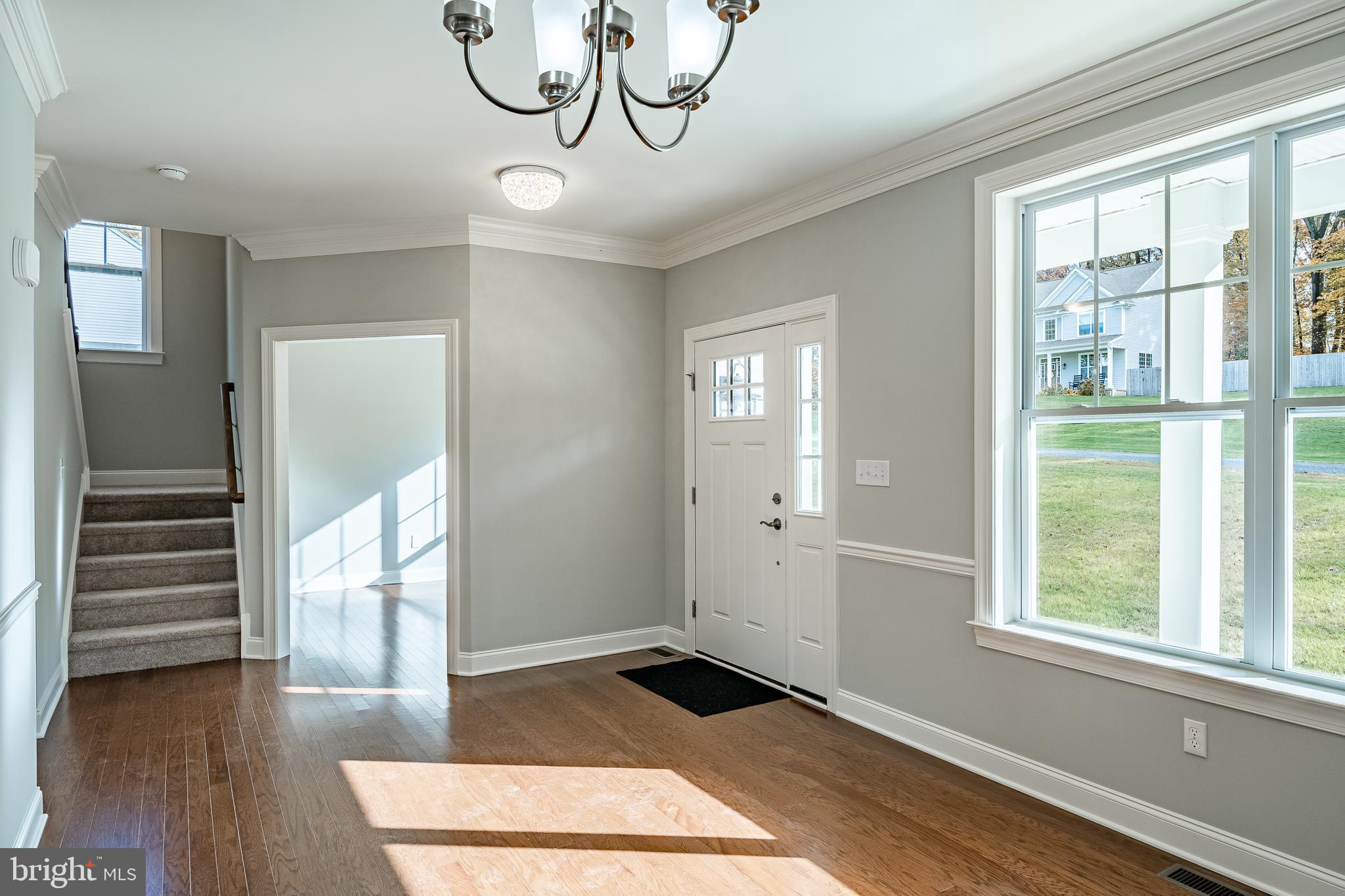 2158 Key Court Kutztown, PA 19530 - Photo 18 of 39 a view of empty room with wooden floor and fan