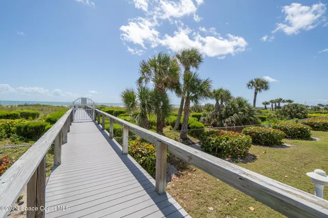 a view of balcony and yard