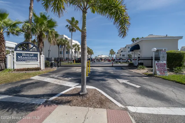 a view of a park with palm trees