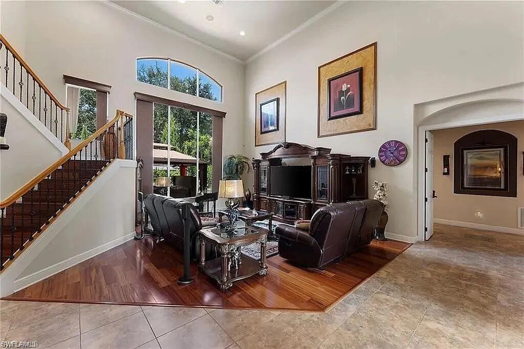 19460 La Serena Drive Estero, FL 33967 - Photo 6 of 30 a living room with furniture and a fireplace