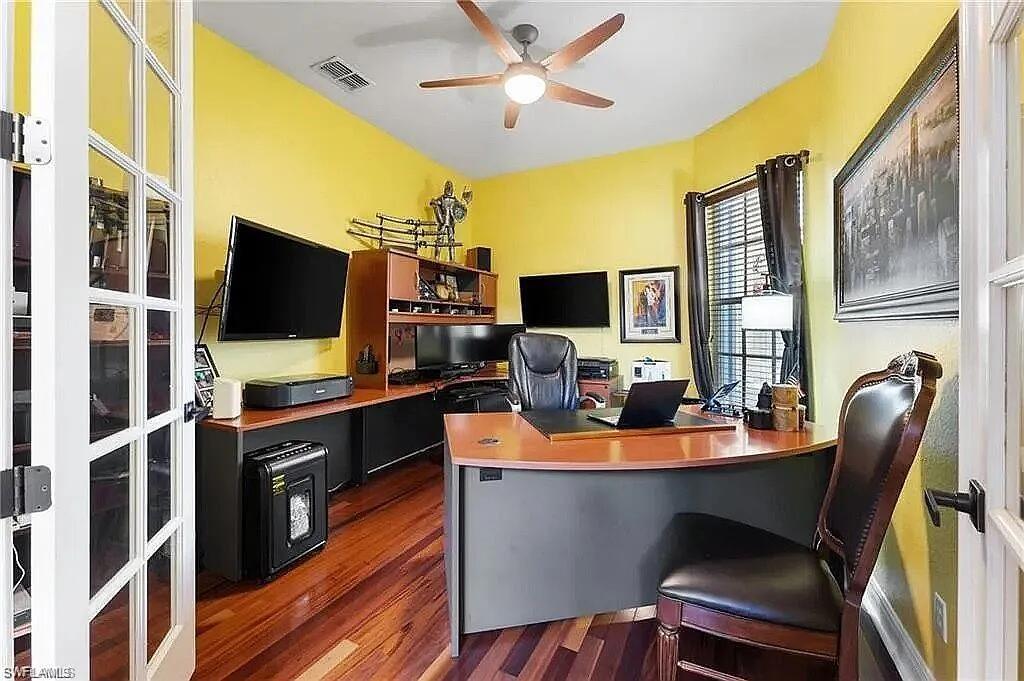 19460 La Serena Drive Estero, FL 33967 - Photo 7 of 30 a dining room with furniture and a flat screen tv
