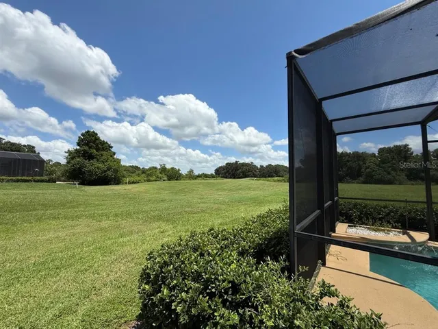 a view of a garden with lake view