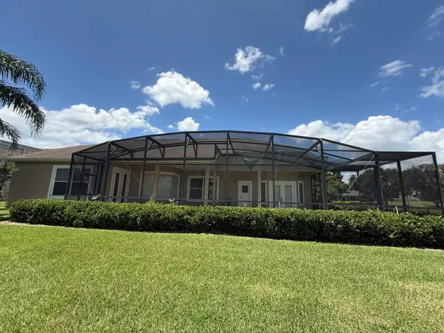 a view of yard and ocean