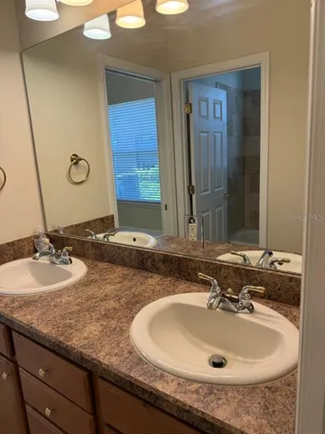 a utility room with cabinets