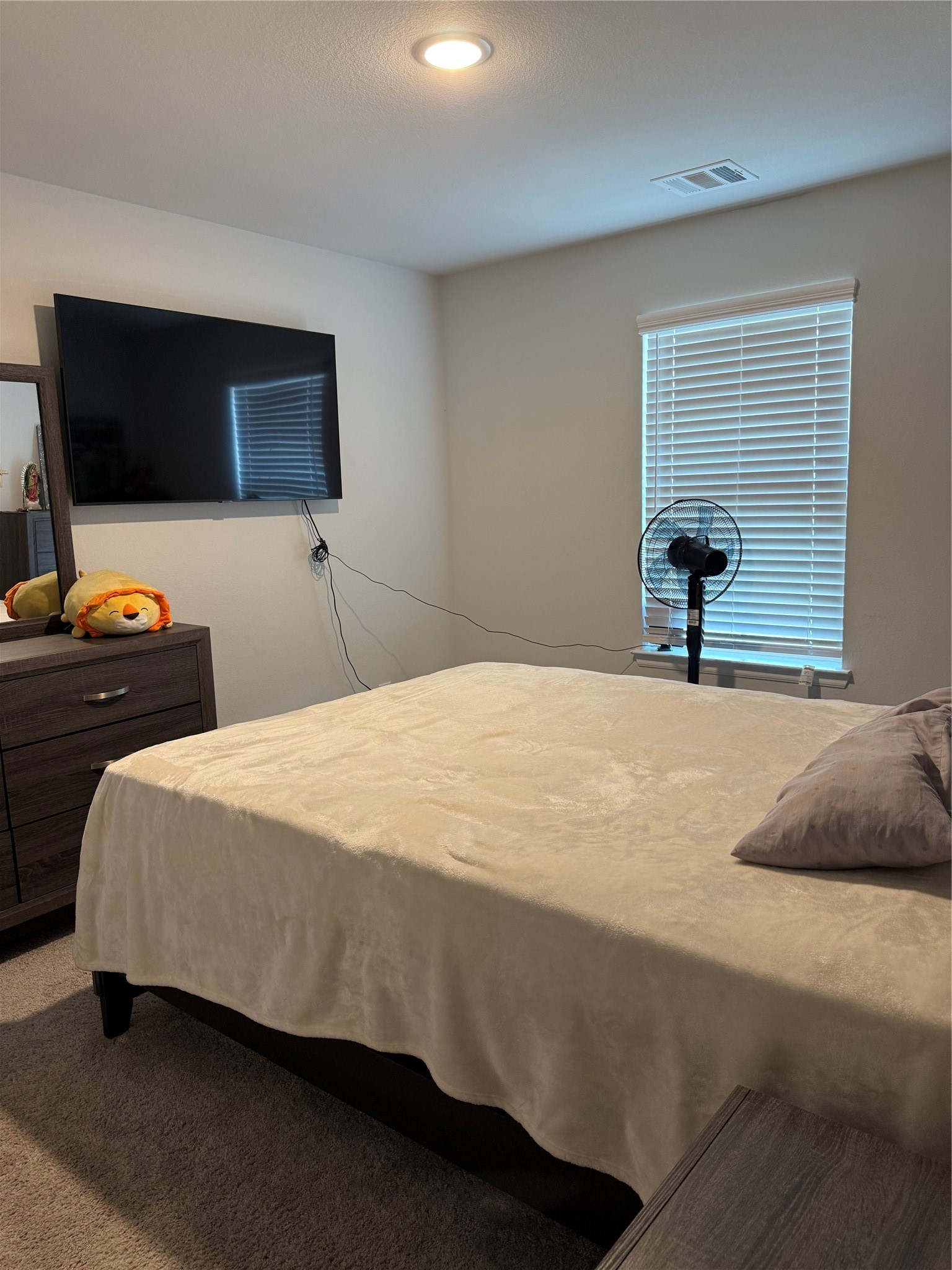 20931 Endeavor Street Porter, TX 77365 - Photo 11 of 15 a bedroom with a bed and a flat screen tv