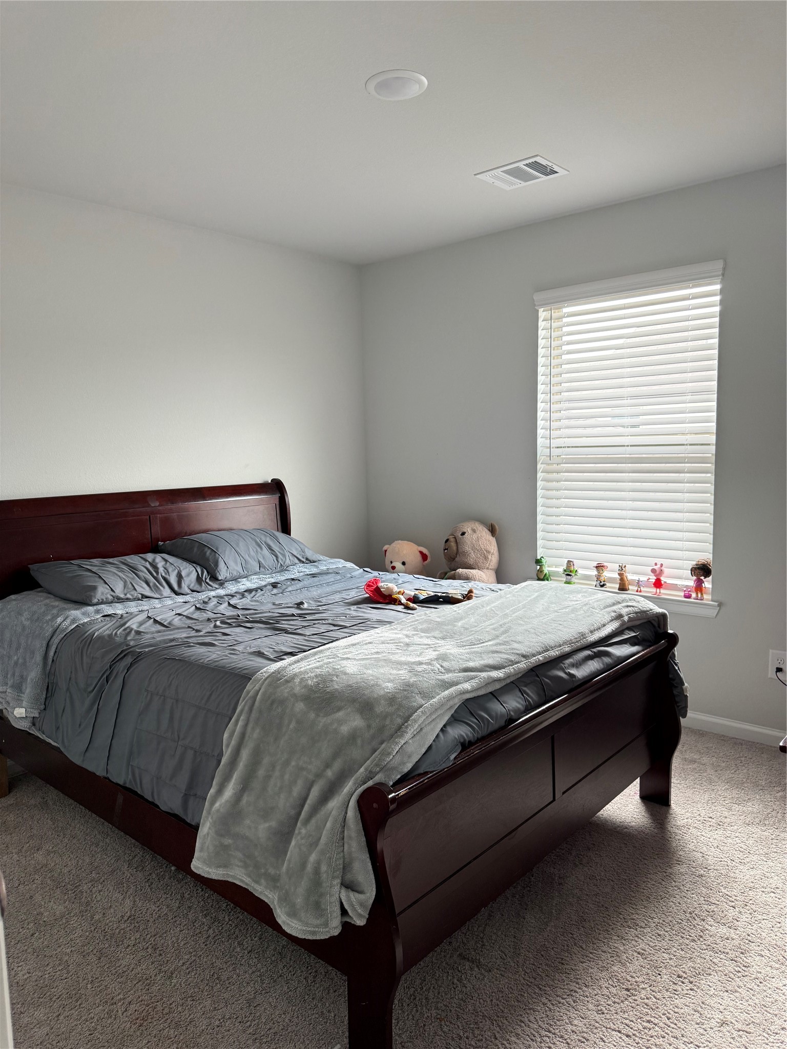 20931 Endeavor Street Porter, TX 77365 - Photo 12 of 15 a bedroom with a bed and window