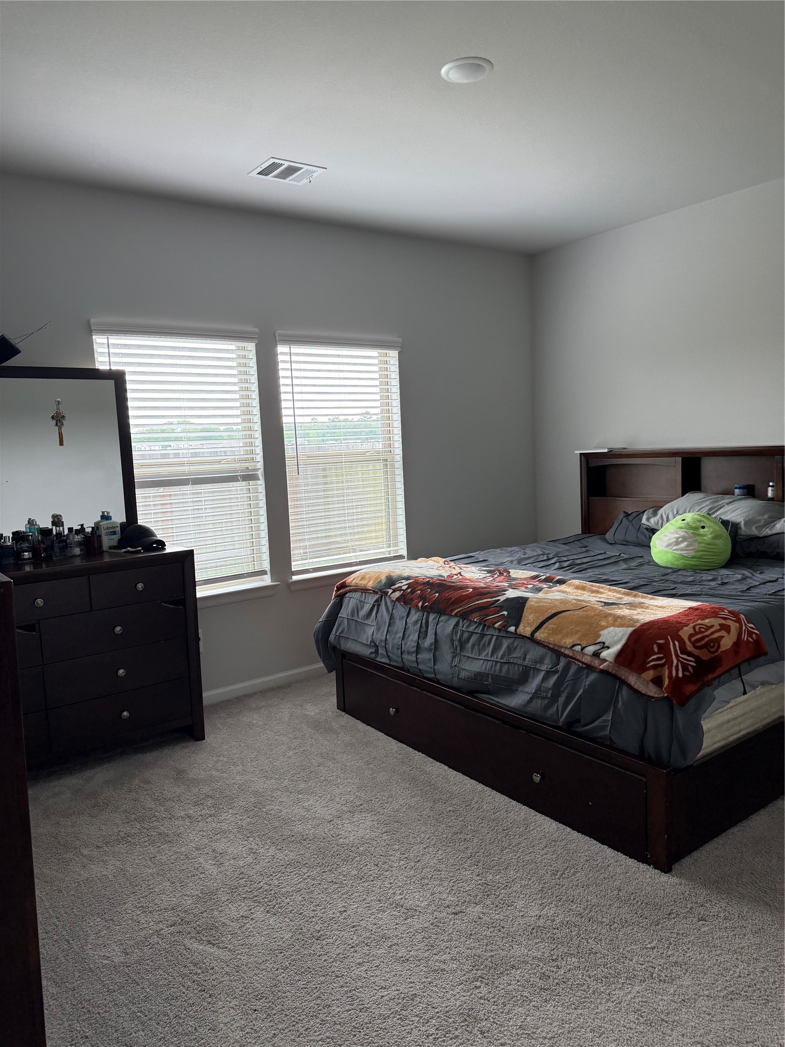 20931 Endeavor Street Porter, TX 77365 - Photo 5 of 15 a spacious bedroom with a bed and window