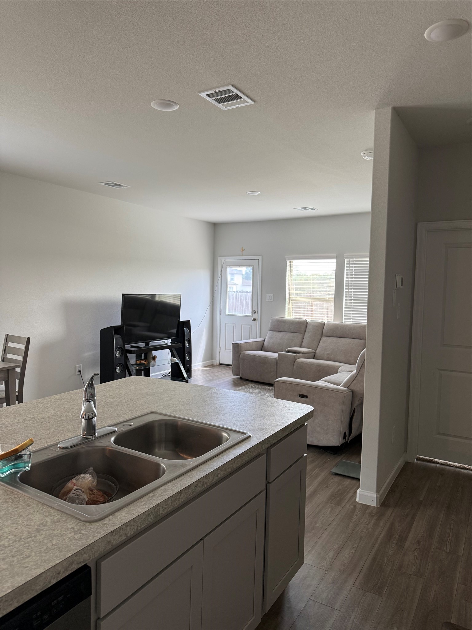 20931 Endeavor Street Porter, TX 77365 - Photo 6 of 15 a kitchen with a stove a sink and a refrigerator