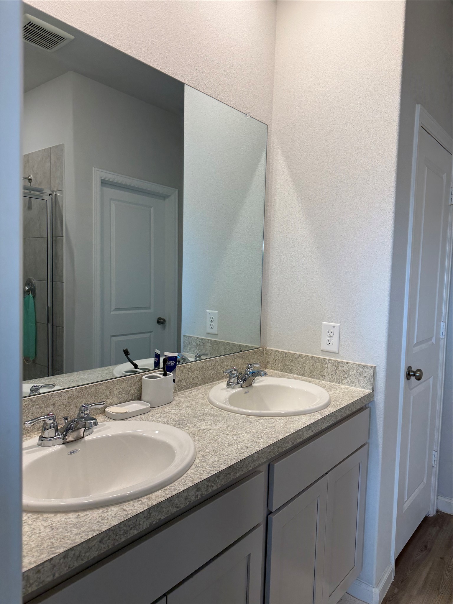 20931 Endeavor Street Porter, TX 77365 - Photo 7 of 15 a bathroom with a granite countertop sink and a mirror