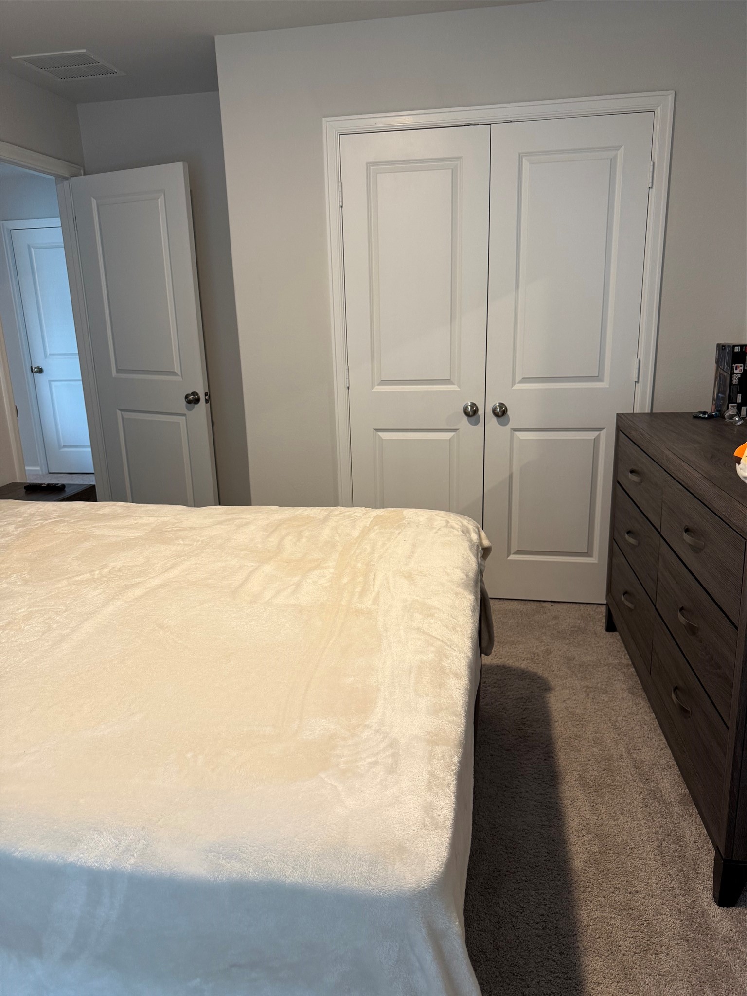 20931 Endeavor Street Porter, TX 77365 - Photo 10 of 15 a bedroom with a bed and cabinets