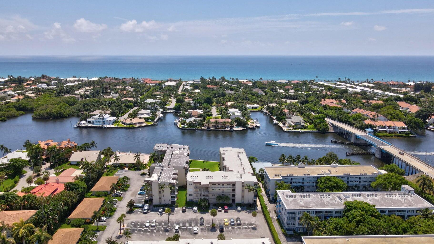 640 Snug Harbor Drive, Unit F6 Boynton Beach, FL 33435 - Photo 2 of 29 an aerial view of lake and city