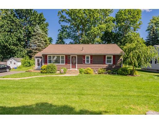 91 Mildred Avenue Springfield, MA 01104 - Photo 2 of 41 a front view of a house with a yard