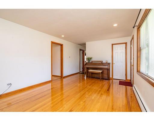 91 Mildred Avenue Springfield, MA 01104 - Photo 22 of 41 a view of empty room with wooden floor and furniture