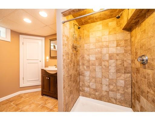 91 Mildred Avenue Springfield, MA 01104 - Photo 35 of 41 a bathroom with a sink and a shower