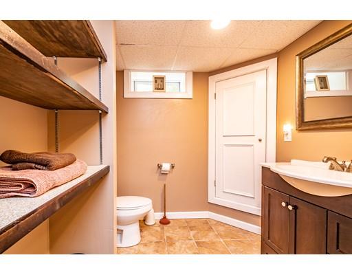 91 Mildred Avenue Springfield, MA 01104 - Photo 36 of 41 a bathroom with a sink a toilet and shower