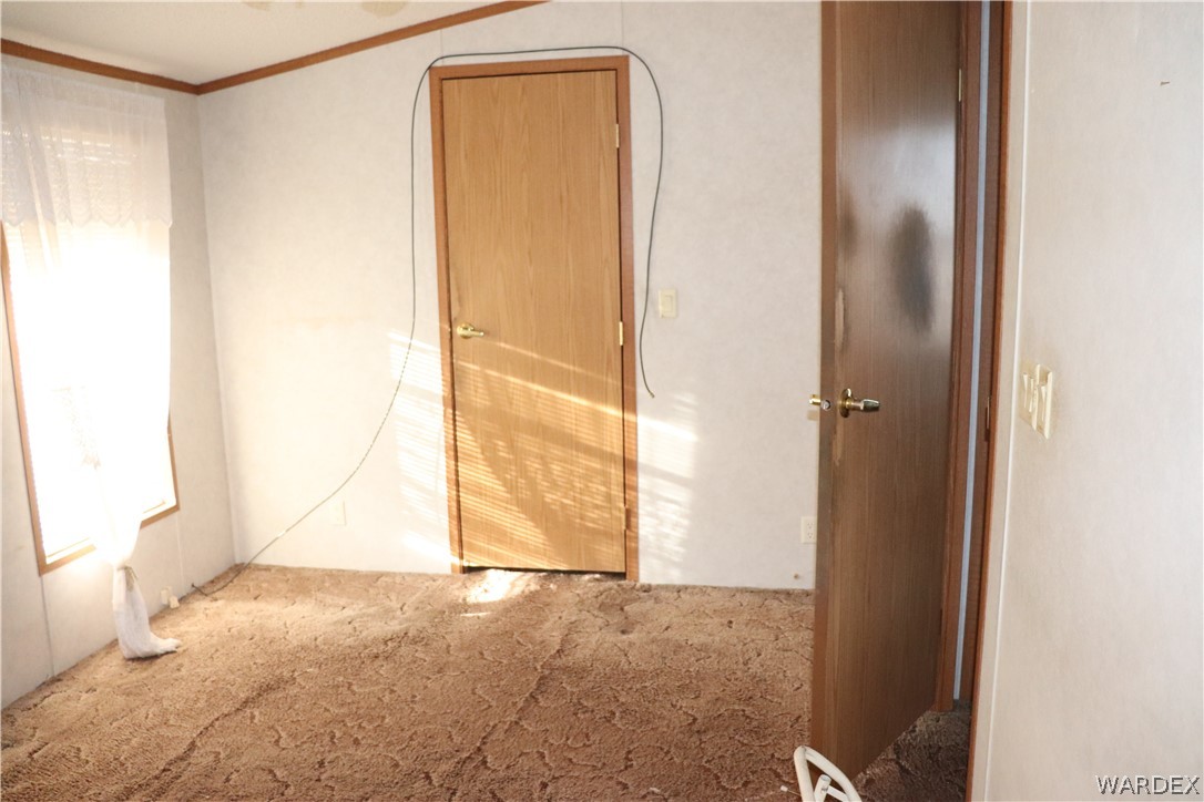 884 Elgin Road Golden Valley, AZ 86413 - Photo 8 of 26 a view of an empty room