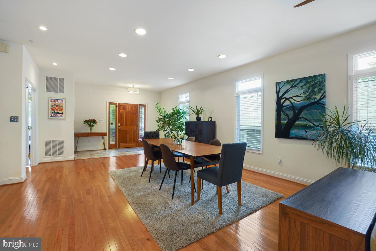 412 Silver Spring Avenue Silver Spring, MD 20910 - Photo 11 of 48 a view of a dining room with furniture and wooden floor