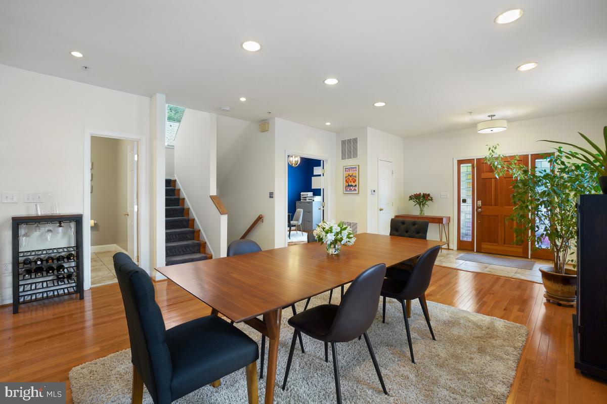 412 Silver Spring Avenue Silver Spring, MD 20910 - Photo 12 of 48 a view of a dining room with furniture and wooden floor