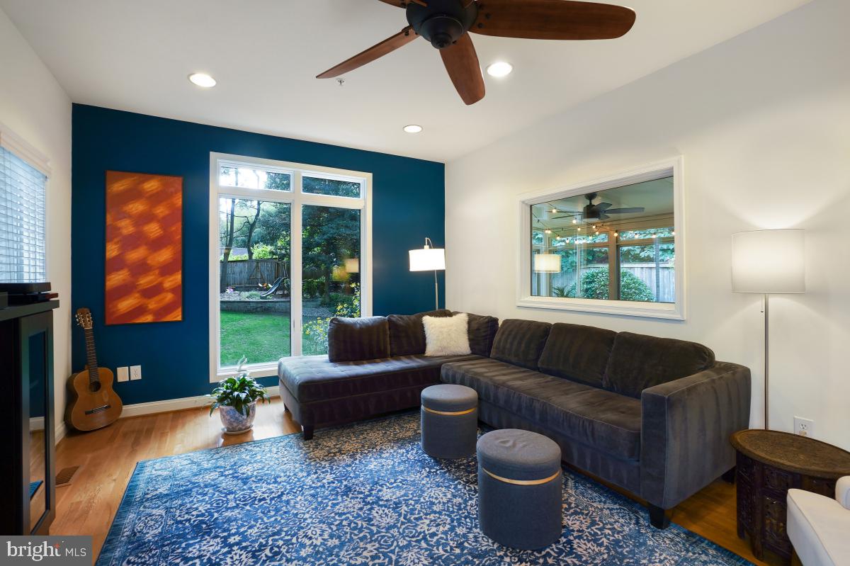 412 Silver Spring Avenue Silver Spring, MD 20910 - Photo 18 of 48 a living room with furniture and a large window