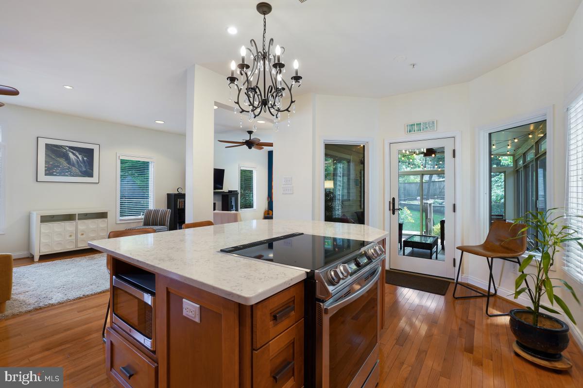 412 Silver Spring Avenue Silver Spring, MD 20910 - Photo 26 of 48 a view of a dining room with furniture window and wooden floor