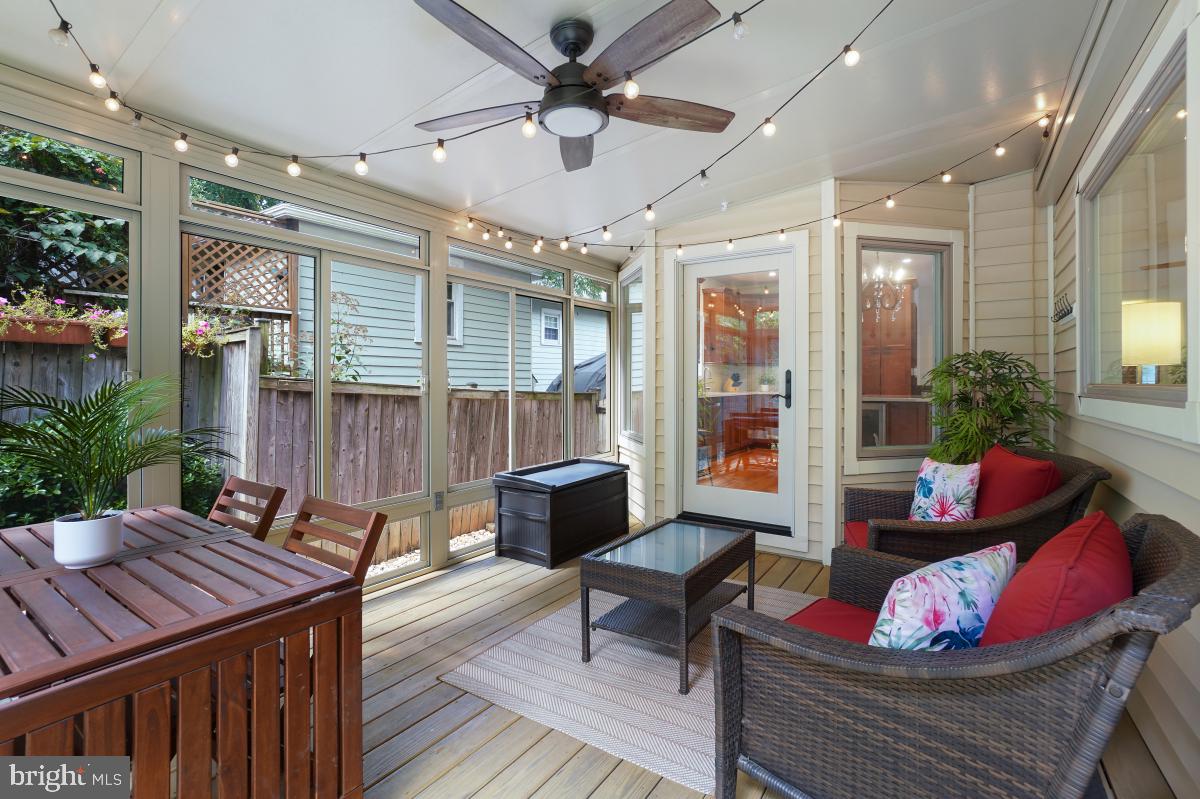 412 Silver Spring Avenue Silver Spring, MD 20910 - Photo 28 of 48 a living room with furniture and a potted plant