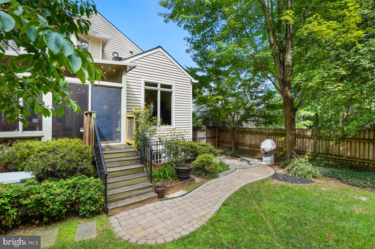 412 Silver Spring Avenue Silver Spring, MD 20910 - Photo 30 of 48 a front view of a house with a yard