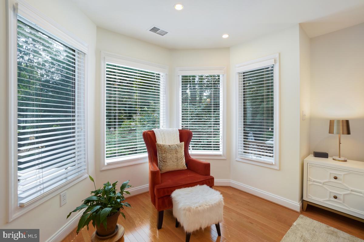 412 Silver Spring Avenue Silver Spring, MD 20910 - Photo 34 of 48 a chair and a table in a room