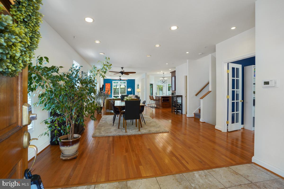 412 Silver Spring Avenue Silver Spring, MD 20910 - Photo 6 of 48 a living room with furniture and a potted plant
