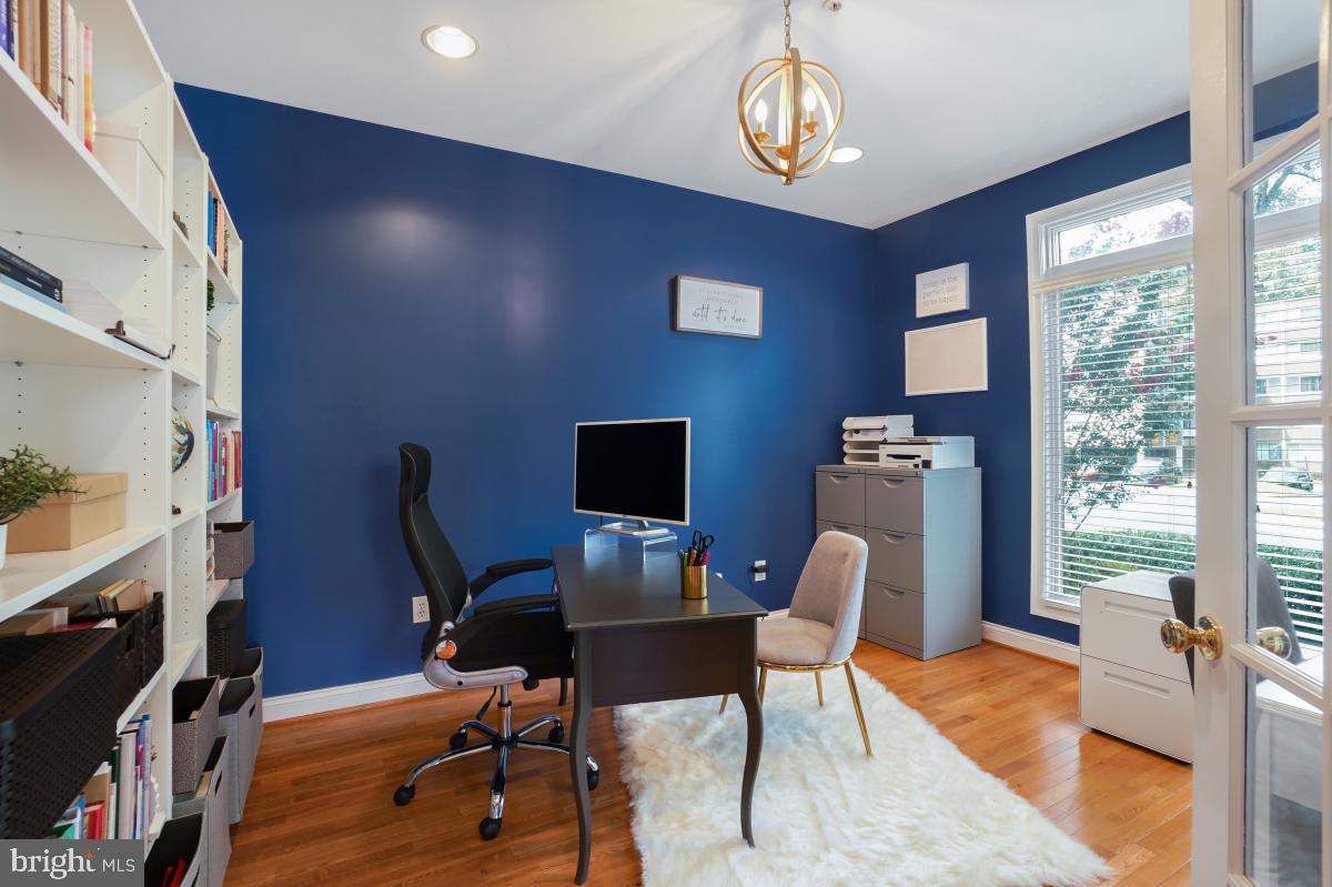 412 Silver Spring Avenue Silver Spring, MD 20910 - Photo 8 of 48 a view of a livingroom with workspace and a window