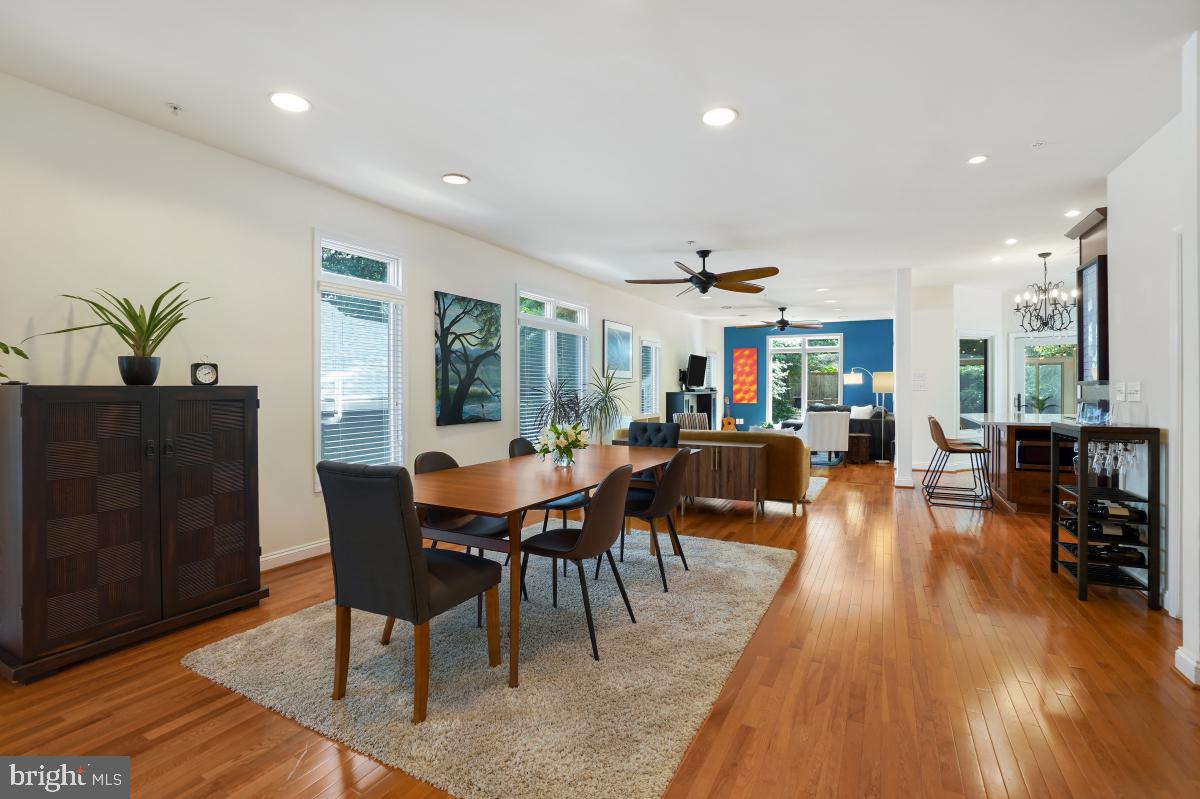 412 Silver Spring Avenue Silver Spring, MD 20910 - Photo 10 of 48 a view of a dining room with furniture and wooden floor