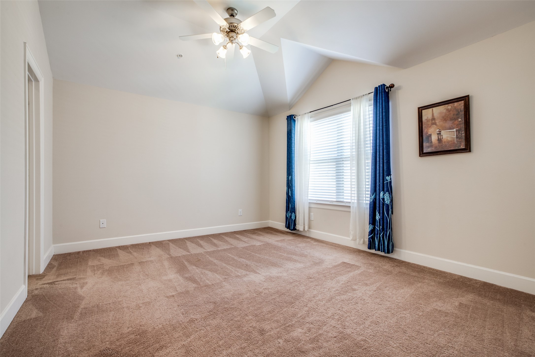 2710 Hullsmith Drive, Unit 401 Houston, TX 77063 - Photo 21 of 25 a view of an empty room with a window