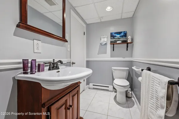 a bathroom with a sink and a toilet