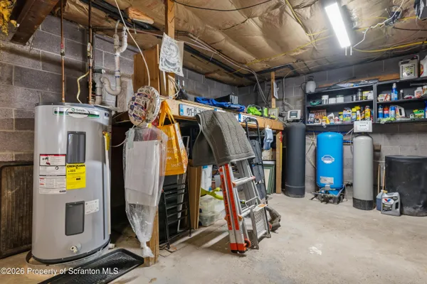 a view of a storage room with utility area