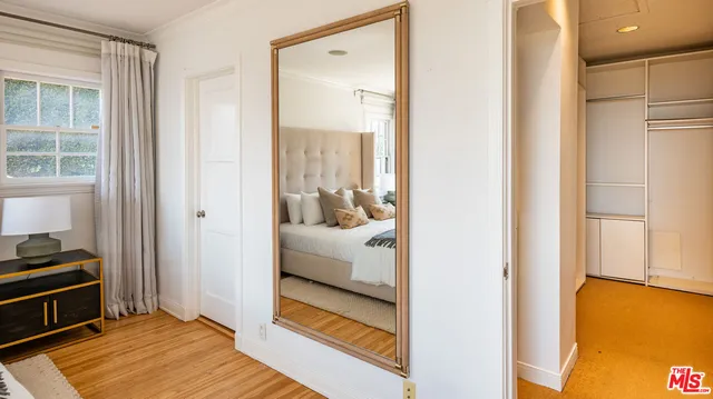 a en suite bathroom with a sink and a window