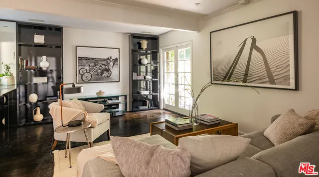 a living room with furniture and window