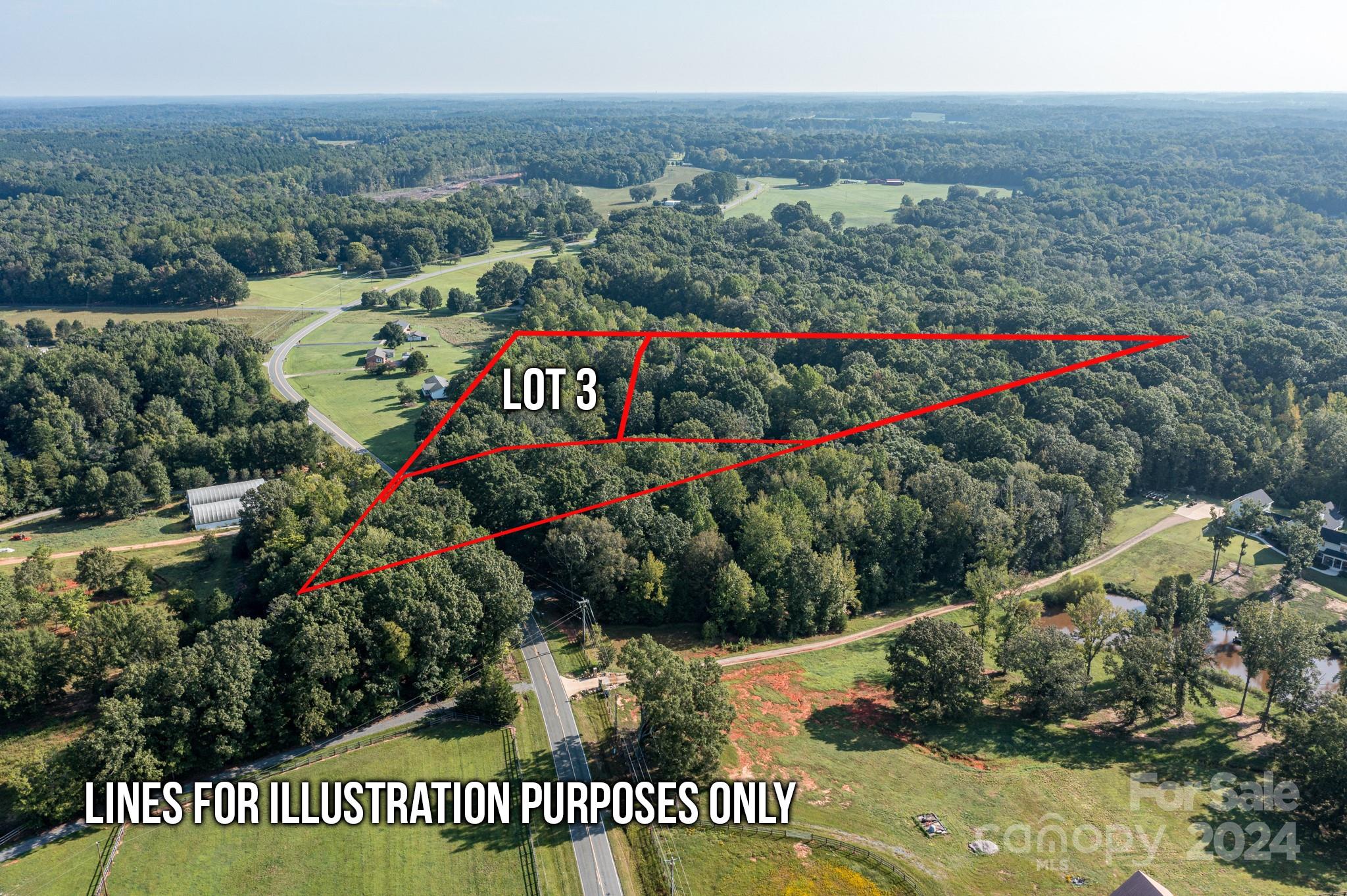5213 Davis Road, Unit 3 Waxhaw, NC 28173 - Photo 3 of 9 a view of a street with a park