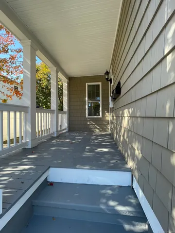 a view of a house with a porch